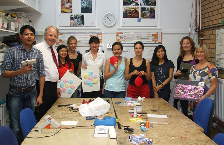 Photograph of volunteers in our workshop